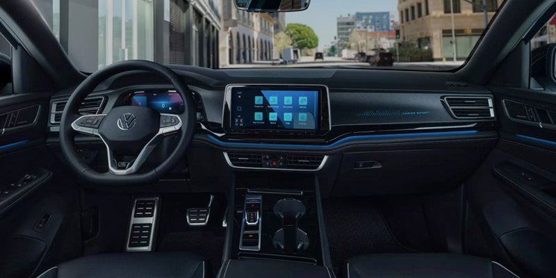 Volkswagen Atlas Cross Sport interior including the steering wheel and infotainment system